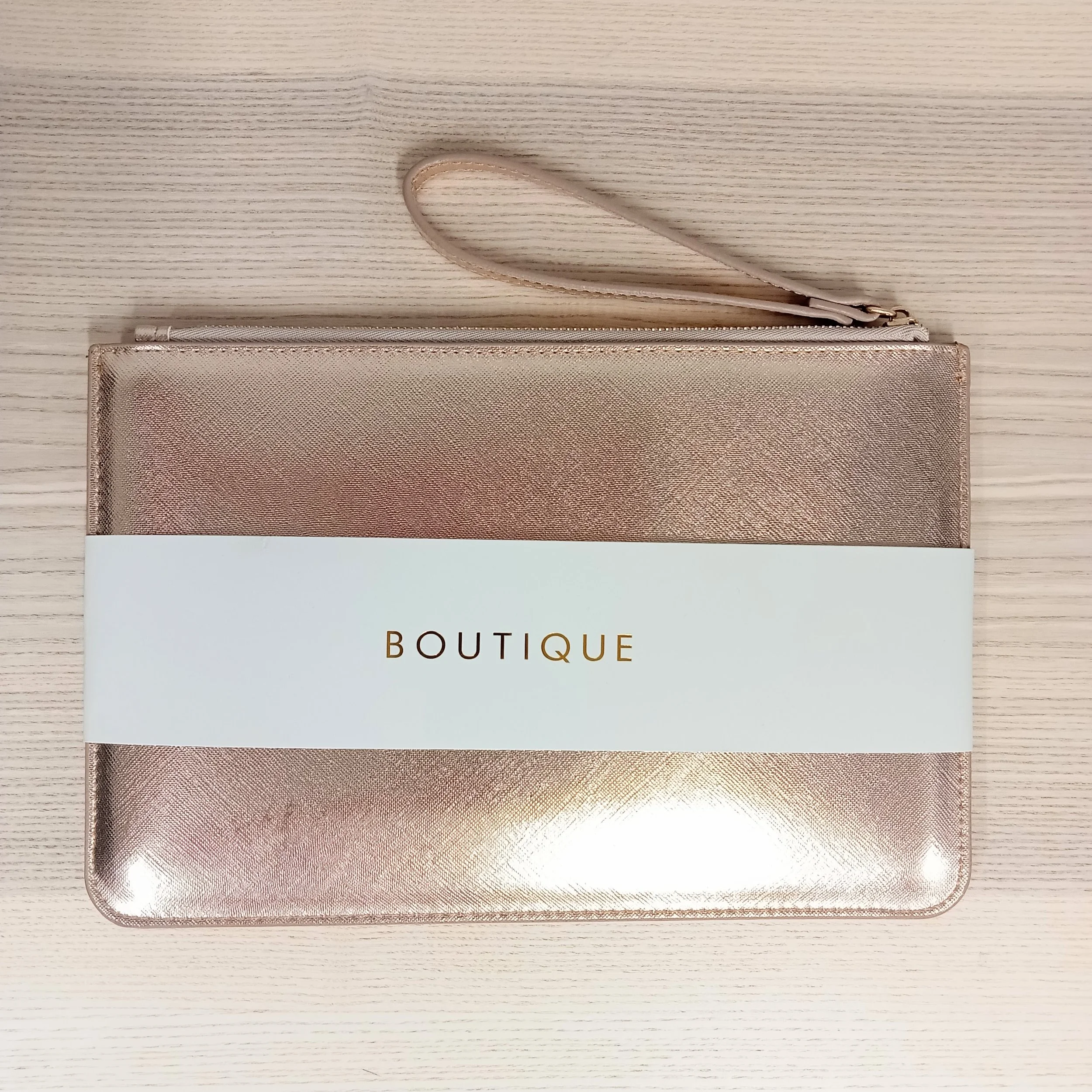 Rose gold top pouch bag